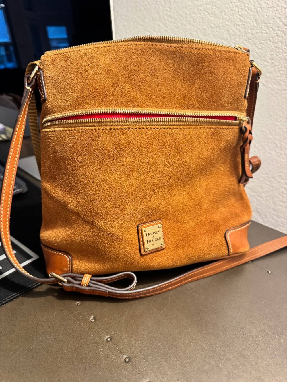 Dooney and Bourke suede with leather accents crossbody bag